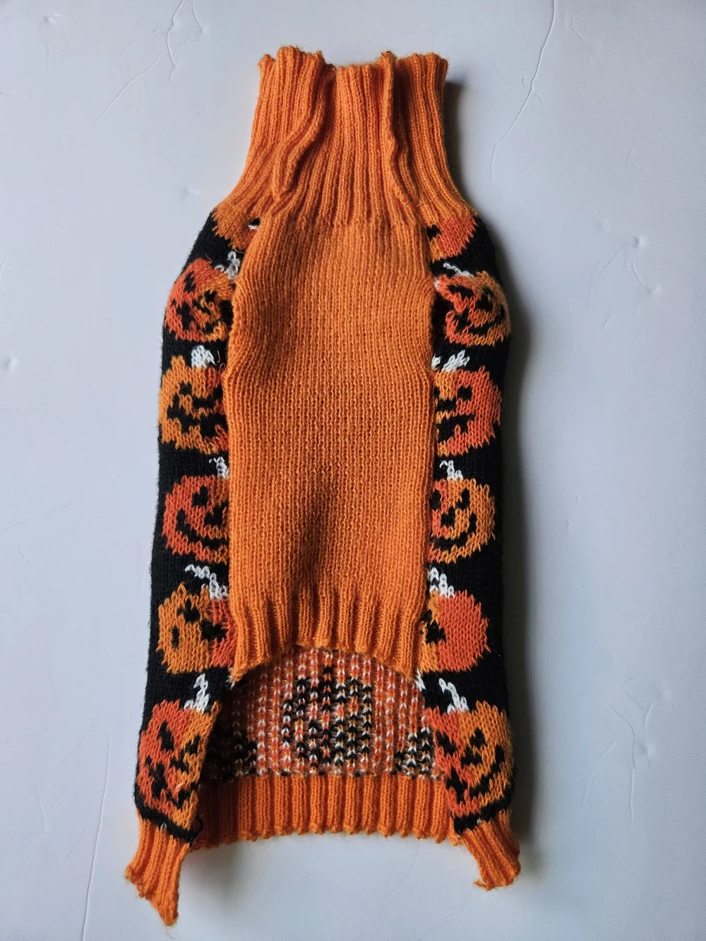 the Hyde & EEK! Boutique Stacked Pumpkins Halloween Dog Sweater. It is a festive